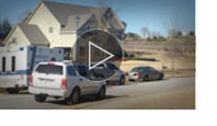 Woman Shoots at 2 Intruders