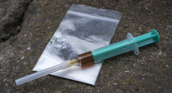Homeowner shoots intruder looking to rob him for heroin money