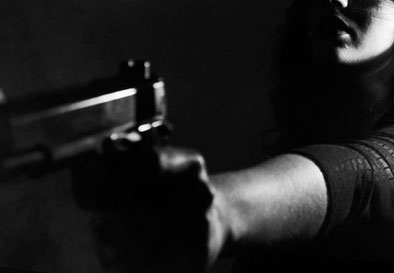 Woman grabs rifle to ward off man violating protective order 