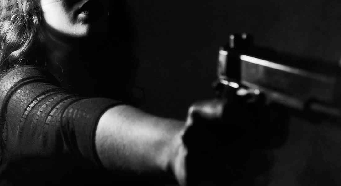 Armed female homeowner defends herself against intruder