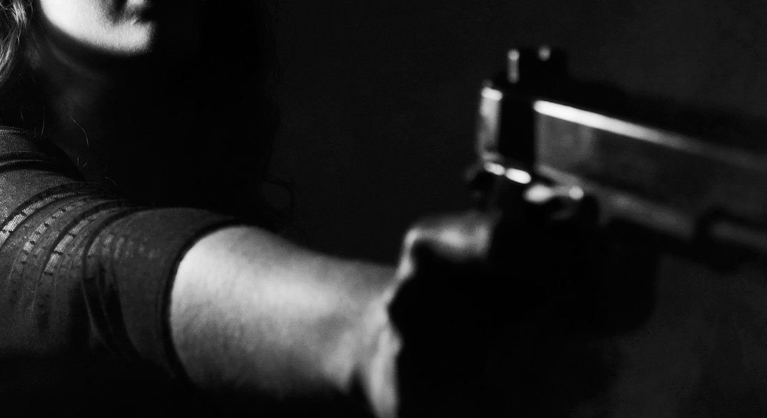 Mom jumps out of shower, grabs gun, shoots intruder to protect her children