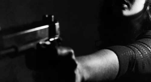 Woman faces off against burglars inside her apartment; wounding two in self-defense