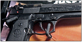 Sthe Beretta 92F used by Bruce Willis as John McClain in Die Hard